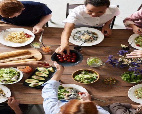 Italian family sharing a healthy dinner at the table
